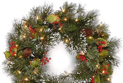 National Tree Company Pre-Lit Artificial Christmas Wreath, Green, Wintry Pine, White Lights, Decorated with Pine Cones, Berry Clusters, Frosted Branches, Christmas Collection, 24 Inches $53.3 (Reg $75.19)